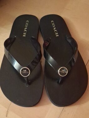 Coach Black Jelly Flip Sandals with Gold Logo Accents